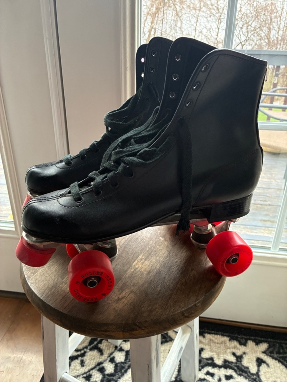 Vintage Black Lace-Up Roller Skate Boots with Red Wheels